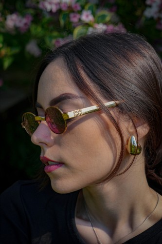 MIU MIU MU B51S - 7OE30Y - 47 Occhiali da sole Bronze Oval
